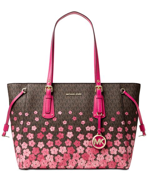 michael kors purse with pink flowers|Michael Kors pink suitcase.